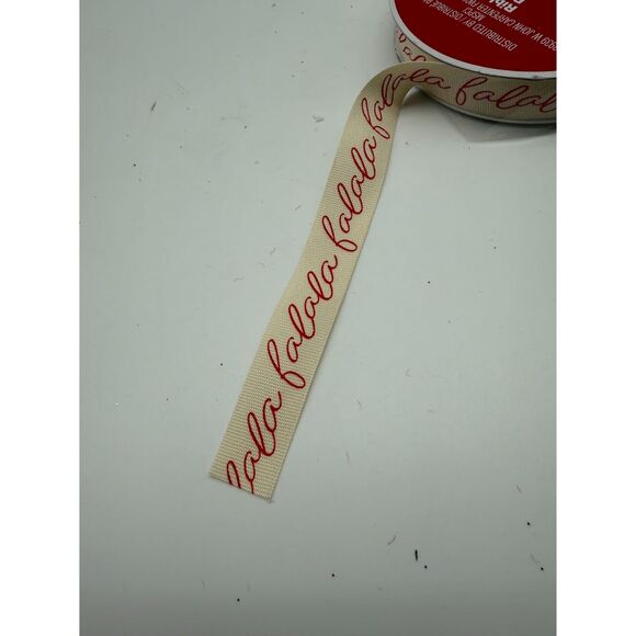 Decorative holiday ribbon featuring the phrase " falala " - Picture 1 of 3